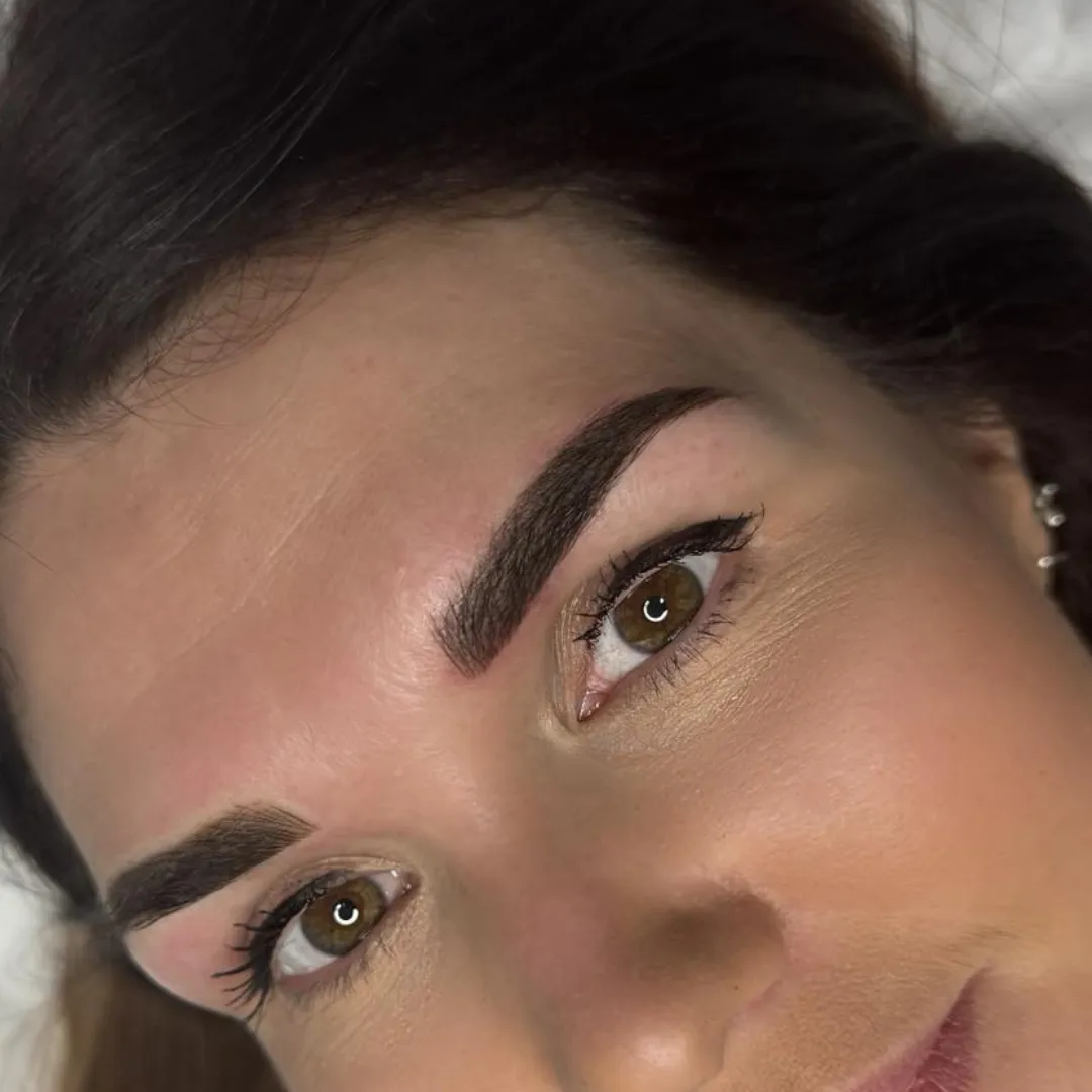 Close-up of expertly microbladed brows styled by Sweet Chanice for a sharp and defined look.